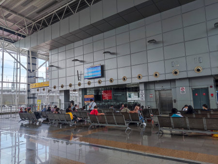 Johor Bahru, Malaysia, Oct 8, 2022. People waits for the train to Singapore in JB Sentral Railway Station, Johor. is an integrated transport hub in Johor Bahruのeditorial素材