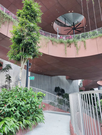 Singapore- 30 Dec, 2022: View of the Green Oasis at CapitaSpring Building. It  is an outdoor garden in the middle of the CapitaSpring building.のeditorial素材