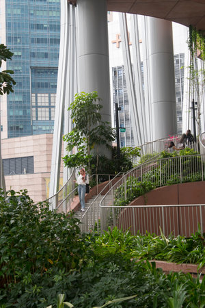 Singapore- 30 Dec, 2022: View of the Green Oasis at CapitaSpring Building. It  is an outdoor garden...