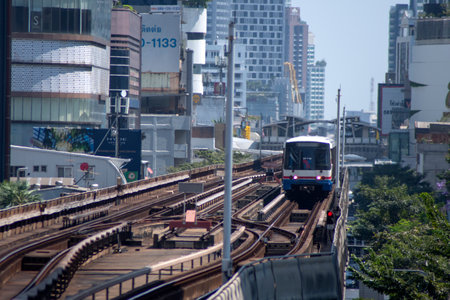 Bangkok, Thailand- 14 Feb, 2023: BTS Sky Train is running in downtown pass through skycrapers...