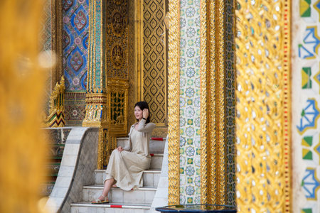 Bangkok, Thailand- 14 Feb, 2023: Tourists visit to The Royal Panthern or Prasat Phra Dhepbiorn inside Grand Palace, Bangkok. It is a mixture of Thai-Khmer style and was constructed by King Rama IVのeditorial素材
