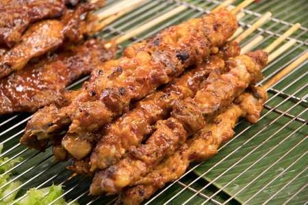 Street food market with grilled skewers food. BBQ pork skewの写真素材