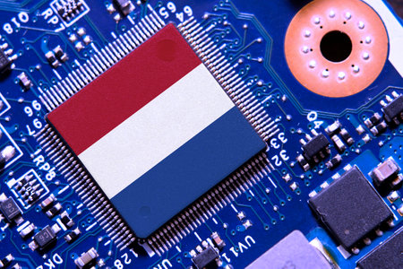 Flag of Netherlands on a processor, CPU Central processing Unit or GPU microchip on a motherboard. Semiconductor industryの写真素材