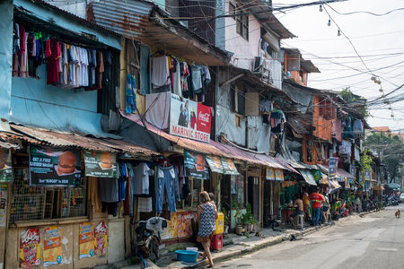Manila, Philippines-15 Oct 2023: People in old town, Intramuros of Manila, capital city of Philippines. Intramuros is the historic centre and oldest district of Manila.のeditorial素材