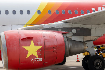 Danang, Vietnam- Feb 26, 2024: A Vietjet aeroplane parks at Danang International Airport, Vietnam....