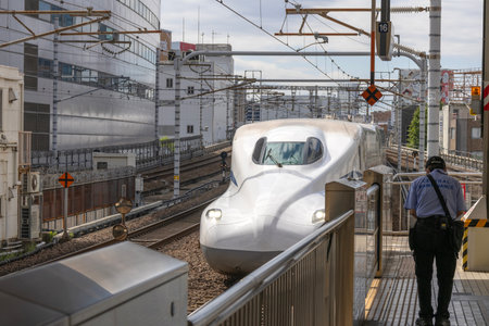 Nagoya, Japan- 9 May, 2024: A Shinkansen bullet train is arriving at station in Nagoya, Japan....