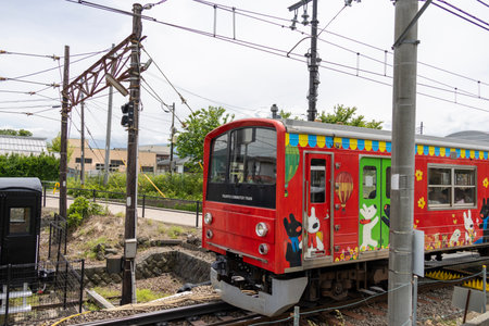 Shimoyoshida, Japan- 15 May 2024: Fujikyu line train approaching to the platform of Shimoyoshida...