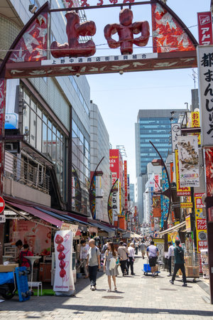 Tokyo, Japan- 18 May 2024: Entrance to Ueno Nakadori (Uechun), a shopping street in Tokyo's Taito Ward. The banner on it is to celebrate the Japan's new Reiwa era.のeditorial素材
