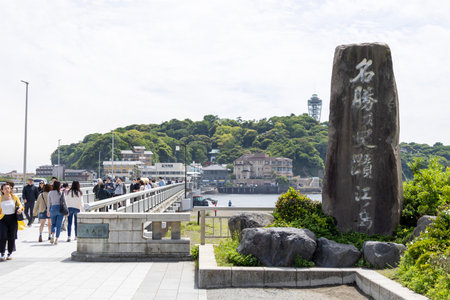 Enoshima, Japan- 14 May, 2024: Tourists walk to Enoshima island in Japan through the Enoshima Benten Bridgeのeditorial素材