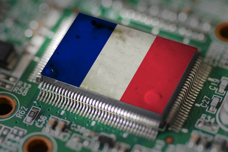 Computer chip on PCB board with France flag. CPU Central processing Unit or GPU microchip on a motherboardの写真素材