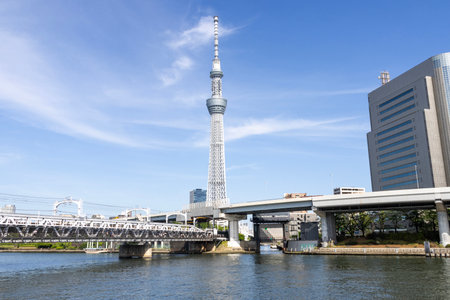 Tokyo, Japan- 18 May, 2024:  View of Tokyo Skytree from Sumida river in Tokyo.  It became the tallest tower in Japan in 2010 and reached its full height of 634 metersのeditorial素材