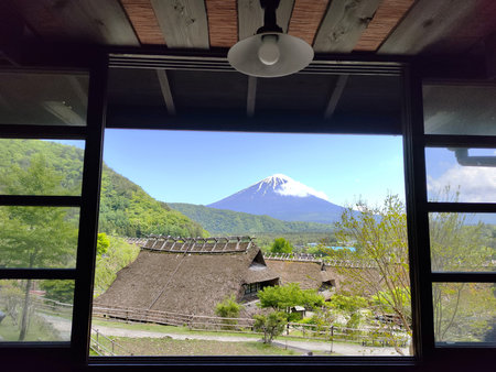 Kawaguchiko, Japan- 16 May, 2024: Saiko Iyashi no Sato Nenba or Traditional Japanese Village in Kawaguchiko, Japan. This is a beautiful place to assemble ancient farm houses close to Mount Fujiのeditorial素材