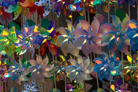 Numerous colorful toy windmills in a large display standの写真素材