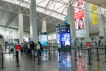 Guangzhou, China- 10 Jun 2024: Departure area of Guangzhou Baiyun International Airport In China.のeditorial素材