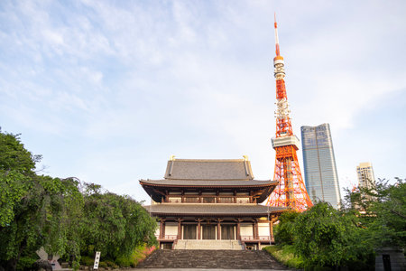Tokyo, Japan- 11 May, 2024: Ancient Zojoji temple and Tokyo tower in blue sky.のeditorial素材