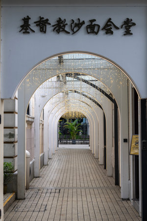 Guangzhou, China- 6 Jun 2024: Walkway of Christ Church Shameen in Shamian Island, Guangzhou. The island is the site of the former British and French concession areaのeditorial素材