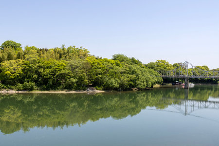Okayama, Japan- 10 May 2024: View of Asahi river at Okayama city, Japan. Okayama Castle and Korakuen are just on the opposite site of this river.のeditorial素材