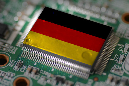 Computer chip on PCB board with Germany flag. CPU Central processing Unit or GPU microchip on a motherboardの写真素材