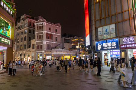 Guangzhou, China- 7 Jun 2024: People walking on Beijing road walking street in Guangzhou. This street has everything on offer from well-known brands to traditional clothingのeditorial素材
