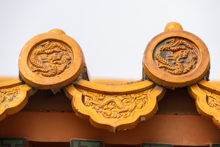 The golden palace glazed tiles of the Forbidden City in Beijing.の写真素材