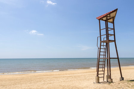 Life guard watch tower at the beach with blue skyの写真素材