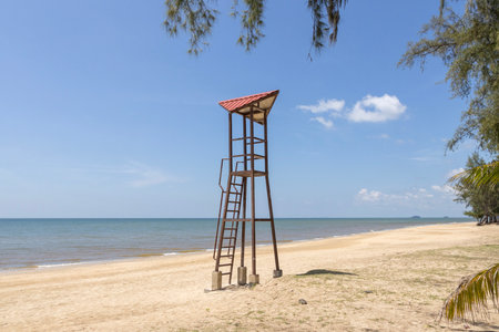 Life guard watch tower at the beach with blue skyの写真素材