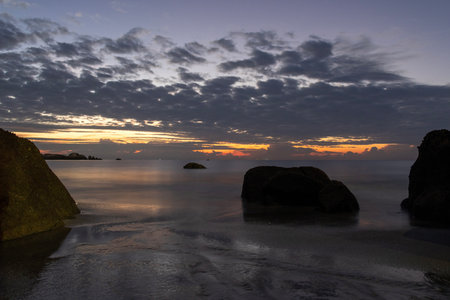 Sunrise at Teluk Cempedak, also known as Palm Beach, which is located in Kuantan, Malaysiaの写真素材