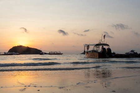 Breathtaking and scenic view of the beach during sunrise at Redang Island, Malaysia. Sunrise watching is one of the best activities in Redangの写真素材