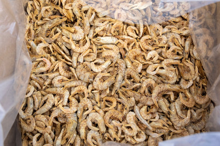 Dried prawns sold on the market. Dried Red shrimp have firmer meat, sweet taste and strong aromaの写真素材