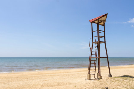 Life guard watch tower at the beach with blue skyの写真素材
