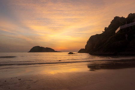 Breathtaking sunrise captured on Redang Island, Malaysia. Radiant sun light and colourful sky, enhancing the natural beautyの写真素材