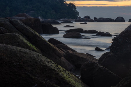 Sunrise at Teluk Cempedak, also known as Palm Beach, which is located in Kuantan, Malaysiaの写真素材