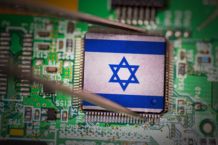 Flag of Israel on a processor, CPU or GPU microchip on a PCB. Pick up by a metal tweezer.