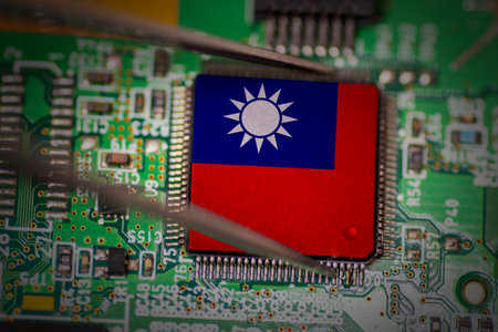 Semiconductor with a Taiwan flag on PCB board. Taiwan stands as the epicenter of global semiconductor manufacturingの写真素材