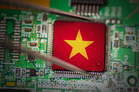 Flag of Vietnam on a processor, CPU or GPU microchip on a PCB. Pick up by a metal tweezer.
