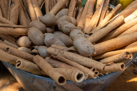 Turmeric and cinnamon in a glass bowlの写真素材