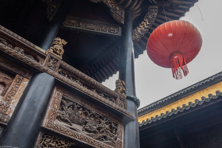 View of the ancient architecture of Huguang Guild Hall in Chongqing, China. It still retain their traditional roles for worship and assembly.の写真素材