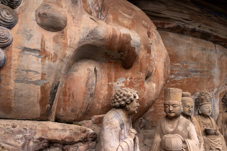 Dazu Stone Carving of the sleeping Buddha. The reclining sculpture located at the Baodingshan Rock Carvings in Chongqing, China. It was designated a UNESCO World Heritage Site in 1999の写真素材