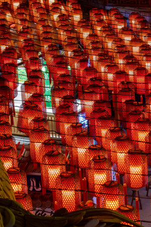 Red lanterns light up at  Shibati or Eighteen Steps in Chongqing, China. It is charming historic...
