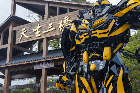 Chongqing, China-4 Nov 2025: Transformer model displayed at entrance of Three Natural Bridges at Wulong National Geological Park in Chongqing, China. his location served as a filming site for movieのeditorial素材