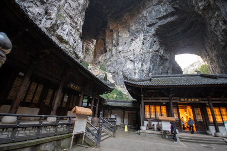Chongqing, China-4 Nov 2025: Tianfu Postal House at Wulong Karst Geological Park, Chongqing. At the bottom of Three Natural Bridges, it was used as a relay station for couriering official documentsのeditorial素材