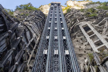 Chongqing, China-4 Nov 2025: Towering Elevator At Wulong Krast National Geology Park Chongqing China. It provides awe-inspiring panoramic views of the stunning karst landscapeのeditorial素材