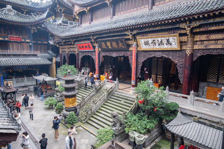 Chongqing, China- 2 Nov 2025: Chongqingâs Louhan Temple which features remarkably architectural design. Built around 1000 years ago, this still-active temple is now sandwiched between skyscrapersのeditorial素材