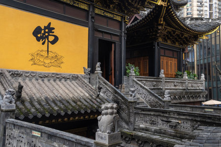 Chongqing, China- 2 Nov 2025: Chongqingâs Louhan Temple which features remarkably architectural design. Built around 1000 years ago, this still-active temple is now sandwiched between skyscrapersのeditorial素材