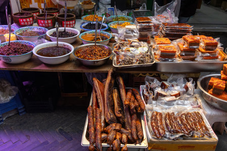Chongqing, China- 2 Nov 2025:  Various spices and cooking ingredients being sold by the street vendor in Chongqing, China.のeditorial素材