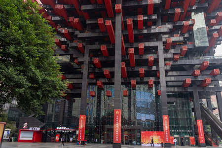 Chongqing, China- 2 Nov 2025: View of Chongqing Art Museum in China. It is recognized for its distinctive architecture featuring a pattern of red and black beams inspired by chopsticks and hot pot.のeditorial素材