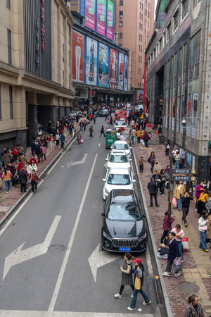 Chongqing, China- 11 Nov 2025:  Busy street with pedestrian walking on the street in Chongqing, China. The resident population of Chongqing municipality is about 31.91 million peopleのeditorial素材