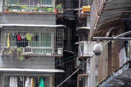 Chongqing, China- 7 Nov 2025: View of residential housing of the old apartment in Chongqing, China.  Densely packed residential structuresのeditorial素材