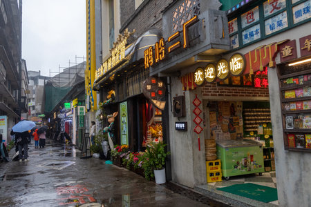 Chongqing, China- 7 Nov 2025: People visit to Erchang Culture and Creative Park in Chongqing, China. It is where creative shops and art studios are lined up, trendy graffiti and literary cornersのeditorial素材