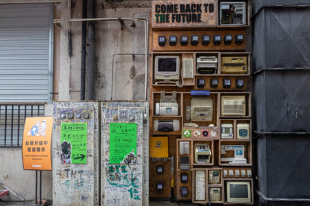 Chongqing, China- 7 Nov 2025: Old technology appliances displayed on the wall at Erchang Culture and...